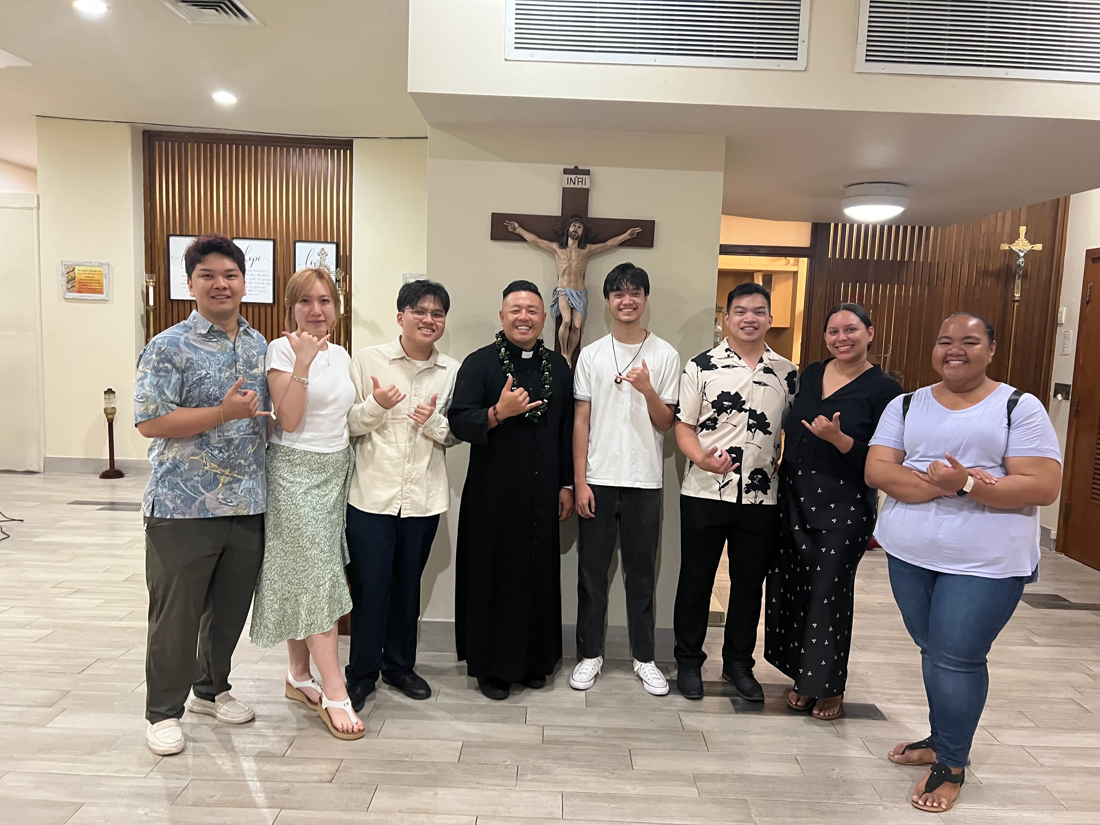 Youth group with priest